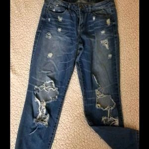 Mid Rise Ripped Jeans